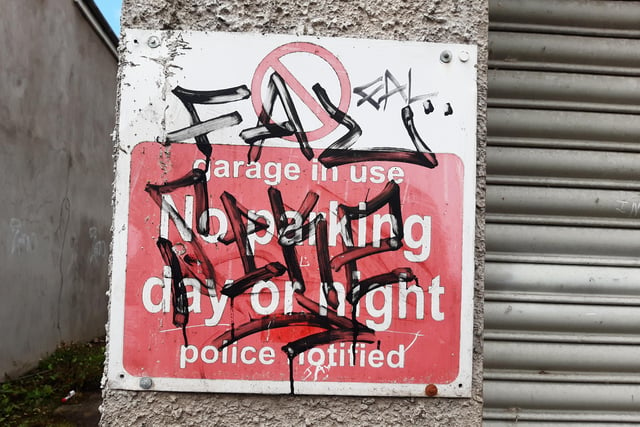 Signs across the Portadown and Craigavon area defaced with graffiti.