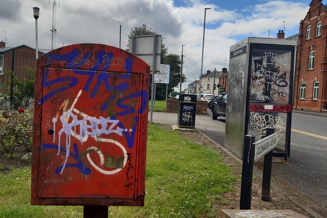 Telephone kiosks as well as litter bins and other service points are covered in graffiti outside the former Cascades Leisure Centre in Portadown, Co Armagh.