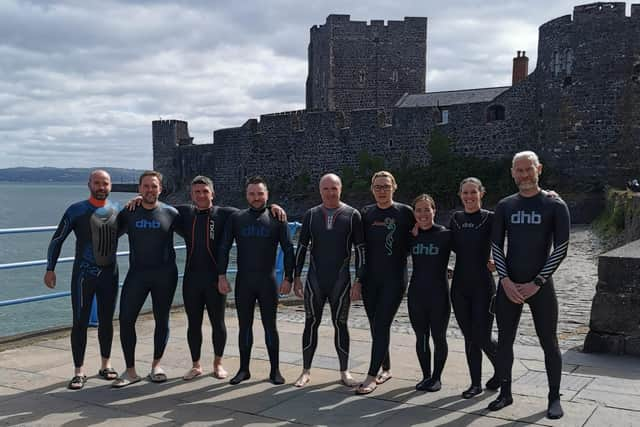 Bob Montgomery, Matthew McAneney, Glenn Picken, Andy Simpson, Larry McAteer, Agnes McAteer, Vikki  McAneney, Claire Hamilton and John Grant will swim across Belfast Lough in aid of Belfast Lough Sailability.