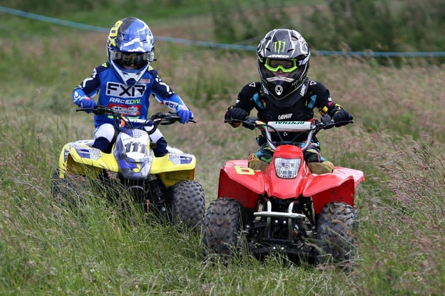 Jamie Cowan and Daniel Cross battling it out in the Junior Youth One 50cc Class. Photo By Andrew McKinstrey.