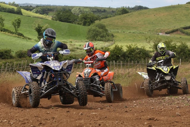 Number 239 Mitchell Adams, Number 21 Mark Mulholland and Number 9 Matthew Gilchrist battling it out in the Clubman Quad Class. Photo By Andrew McKinstrey
