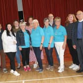 Members of Christ Church, Lisburn, teams who have travelled to St Apollo School over the years, and some of those whose plans to visit Uganda in 2020 were thwarted by the pandemic, along with the Ven Paul Dundas (front, second from left), rector and author of Never Lose Hope