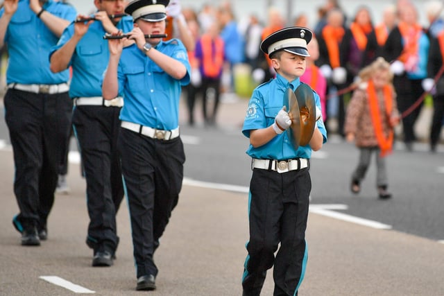 This young bandsman concentrates hard on the job in hand.