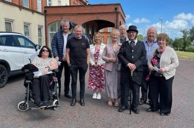 Members of the Thompson House Hospital Relatives Support Group; Yvonne and Martin Adams, Kyle Suckling (singer & volunteer), Gillian McConvey, Edna Elliott, Dermott Hutchinson, John Guiney, Ken Patterson and Brenda Hannawin