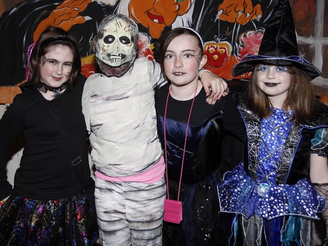 Naomi, Charlie, Amy and Katie having fun at the Killowen Primary School Halloween Party in 2010