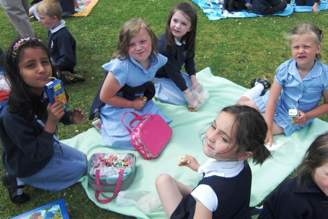 Pupils from Killowen Primary School pictured enjoying their lunches outside back in June 2010. The school canteen - Snazzy Snacks provided a take away picnic lunch for the children