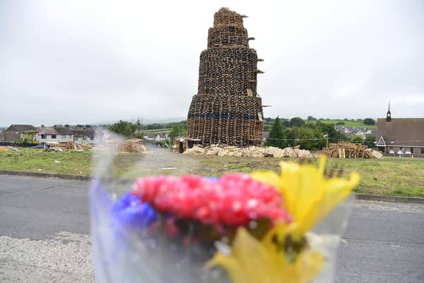 Flowers left at the scene of the Antiville bonfire in Larne.Picture: Pacemaker Press