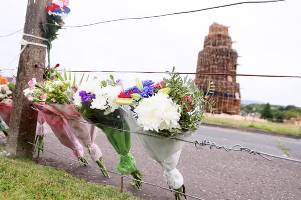 Flowers left near the Antiville bonfire in Larne in the aftermath of the tragedy.