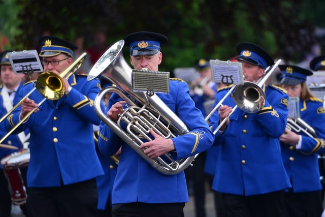 Keeping in tune during the parade. 
Picture: Arthur Allison/Pacemaker Press
