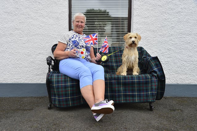 Jean McKeown and dog Millie pictured enjoying the parade.
Picture : Arthur Allison/Pacemaker Press