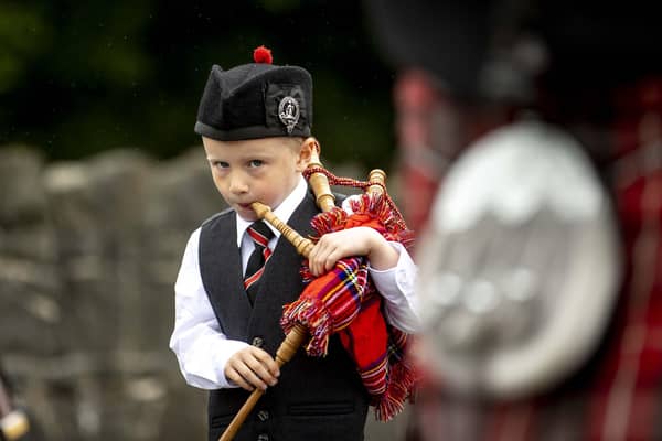 A young piper concentrates on the job in hand during the Braid District parade.