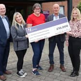 Pictured at the cheque presentation to NI Hospice, are (from left to right) Pat McGarry, logistics director, Henderson Group; Molly Wilson, NI Hospice community outreach executive; Grace Stewart, head of NI Children’s Hospice services; Gary Reid; and Charlene McGonagle from Henderson Wholesale. 
Photograph by Declan Roughan / Press Eye