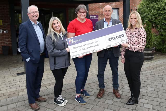 Pictured at the cheque presentation to NI Hospice, are (from left to right) Pat McGarry, logistics director, Henderson Group; Molly Wilson, NI Hospice community outreach executive; Grace Stewart, head of NI Children’s Hospice services; Gary Reid; and Charlene McGonagle from Henderson Wholesale. 
Photograph by Declan Roughan / Press Eye