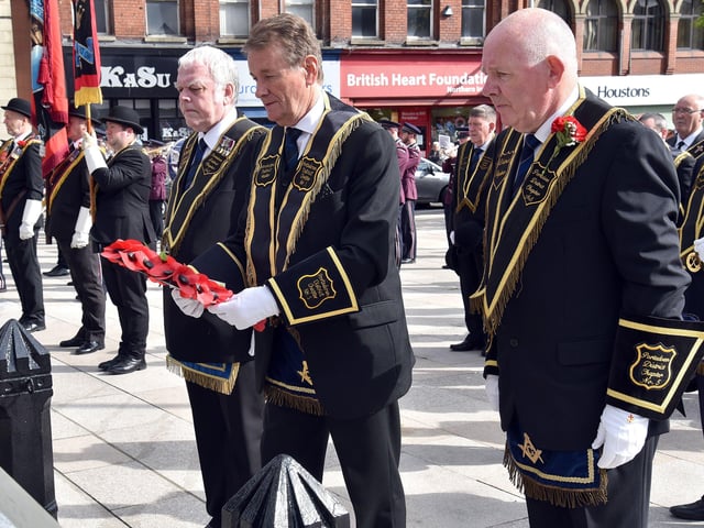 RBP Worshipful District Master, Raymond Walker lays a wreath at the War Memorial during the Thirteenth parade. PT29-214.