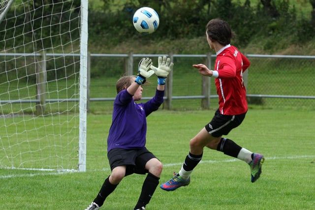 Stonebridge goalkeeper Harrison Ashe, defends his net from the Maiden City Academy attack in their Foyle cup under 13 game at Newbuildings.  INLS 1230-520MT.