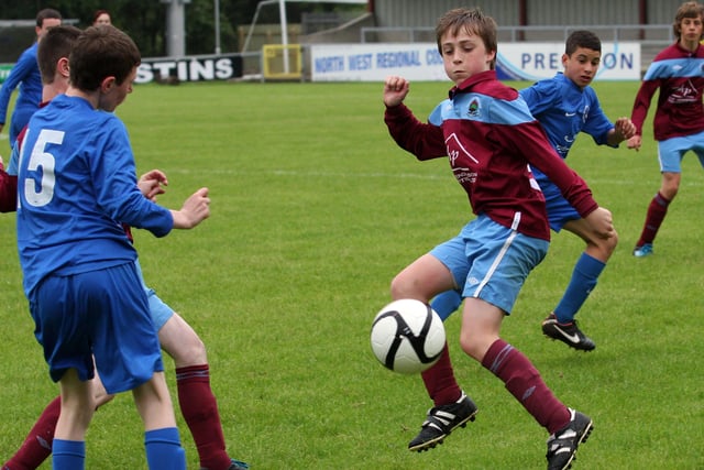 Institute’s Callum O’Neill, attempts to bring the ball under control during the action against Ballinamallard, in their Foyle cup under 14 game at the Riverside Stadium.  INLS 1230-523MT.