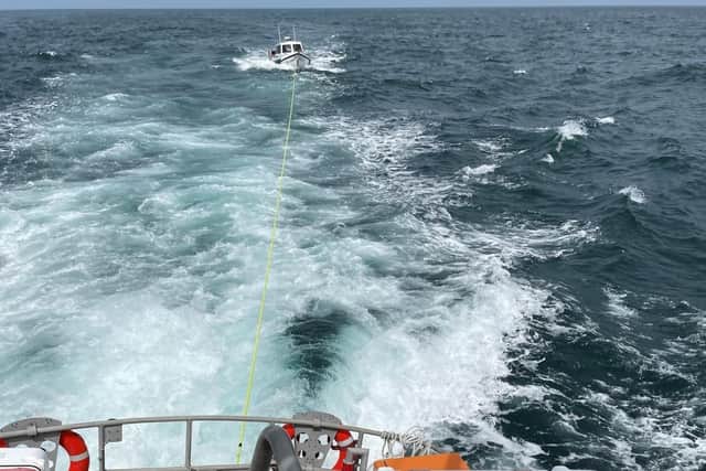 Five adults and four children have been rescued by lifeboat crew from Red Bay RNLI