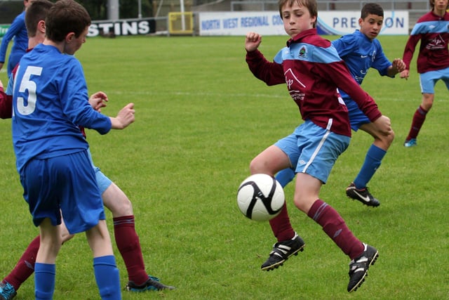 Institute’s Callum O’Neill, attempts to bring the ball under control during the action against Ballinamallard, in their Foyle cup under 14 game at the Riverside Stadium.  INLS 1230-523MT.