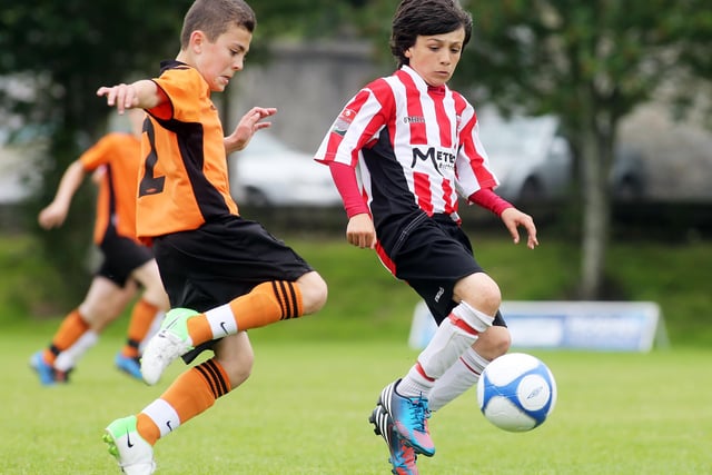©/Lorcan Doherty Photography -  July 21th 2012. 

Hughes Insurance Foyle Cup U-12 Plate Final. Derry and District Youth FA V Cavan Monaghan Youth League. Derry's Anthony McGuinness and Cavan Monaghan's Marc Melvin.

Photo Credit Lorcan Doherty Photography