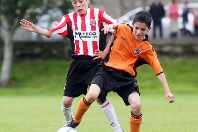 ©/Lorcan Doherty Photography -  July 21th 2012. 

Hughes Insurance Foyle Cup U-12 Plate Final. Derry and District Youth FA V Cavan Monaghan Youth League. Derry's Morgan Murray and Cavan Monaghan's Eli Ward.

Photo Credit Lorcan Doherty Photography