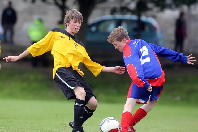 ©/Lorcan Doherty Photography -  July 21th 2012. 

Hughes Insurance Foyle Cup U-14 Plate Final. Maiden City Academy V Dungoyne (Belfast). Maiden City's Callum Whiteside and Dungoyne's Jack Watson.

Photo Credit Lorcan Doherty Photography