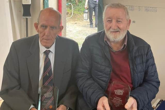 Harold (left) and Samuel (right) with their awards
