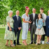 Ray Hutchinson, Managing Director of Gilbert-Ash receives an OBE at Bucking hame Palace London. He is pictured with his family. Photo credit: Simon Jacobs
