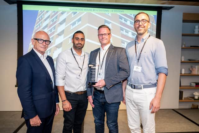 Kilwaughter Minerals brand, K Systems, wins ‘Best Tall Building Retrofit Project’ award at the prestigious Tall Buildings Awards 2022. Pictured are Scott Bradshaw and Tarvinder Katavada (centre) of K Systems, with members of the project team which delivered the best-in-class refurbishment beating stiff competition from UK counterparts, receiving the accolade at the annual Tall Buildings awards ceremony in London.