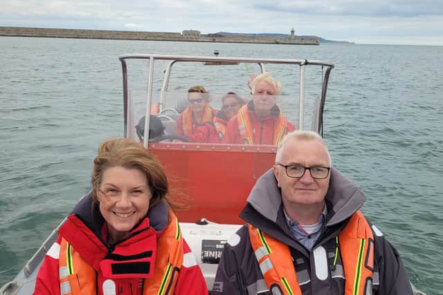 Una Culkin (front left) enjoying a trip around the bay with the Irish National Sailing and Powerboat School