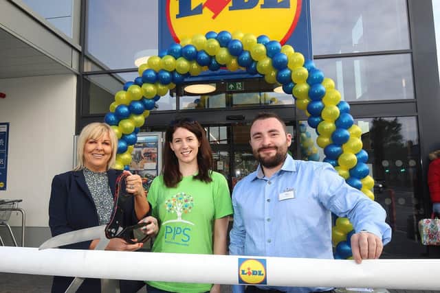Officially opening the new Lidl store at Shore Road, Belfast are Christine McKeown of Ashton Community Trust; Ashleigh Johnston from PIPS and Ben Crawford store
