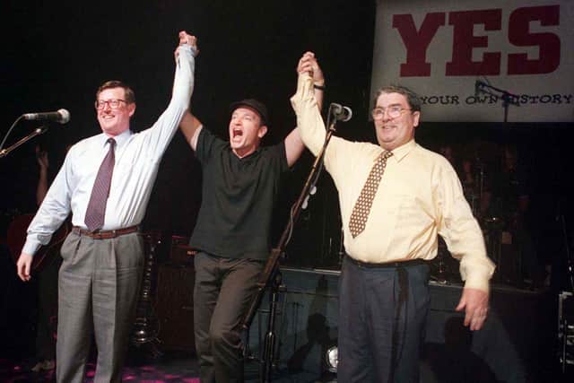 Ulster Unionist leader David Trimble, SDLP leader John Hume and Bono of U2 pictured together in 1998 on stage at the Waterfront hall in Belfast this evening for a concert to promote a 'yes' vote in the referendum. Picture Paul Faith / Pacemaker.