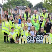 McDonald’s McKinstry Road staff members with Lisburn Distillery FC players.