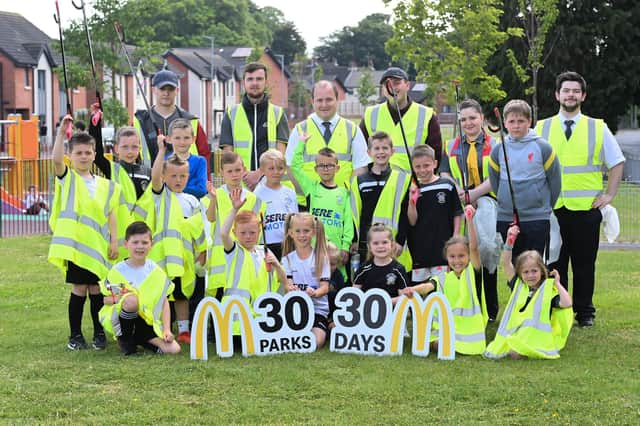 McDonald’s McKinstry Road staff members with Lisburn Distillery FC players.