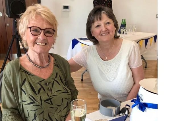 Larne W.I. members, Kali Openshaw and Margaret Reilly enjoying their afternoon tea