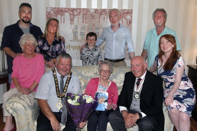 Jean Jackson who celebrated her 100th birthday recently pictured with Peter Sheridan, Deputy Lieutenant of County Londonderry, the Mayor of Causeway Coast and Glens Borough Council Councillor Ivor Wallace and family members