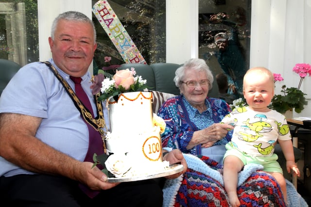 The Mayor of Causeway Coast and Glens Borough Council Councillor Ivor Wallace pictured with Ida Love during his visit to mark her 100th birthday, along with Ida’s great-great-great nephew Matt Gray