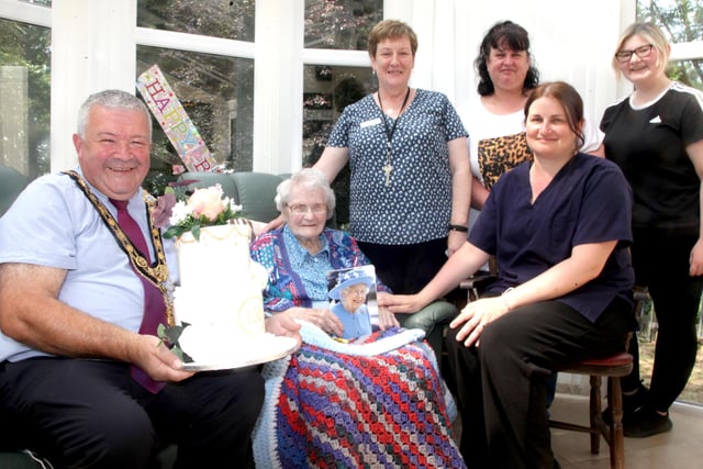 The Mayor of Causeway Coast and Glens Borough Council Councillor Ivor Wallace pictured with Ida Love who celebrated her 100th birthday recently along with her great-niece Sharon Maxwell and staff at The Cara Residential Home in Rasharkin, Linda Jamieson (Manager), Natalie Dunlop (Senior-in-charge Officer) and Aleisha McErlean (Care Assistant)
