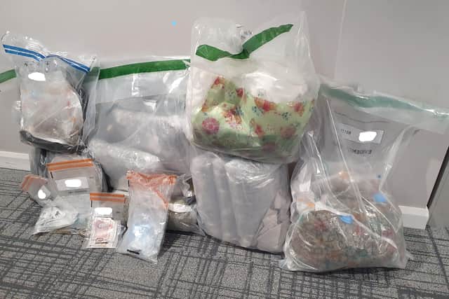 A number of items seized from Belfast. Arrests were made by the PSNI in Lurgan and Belfast.