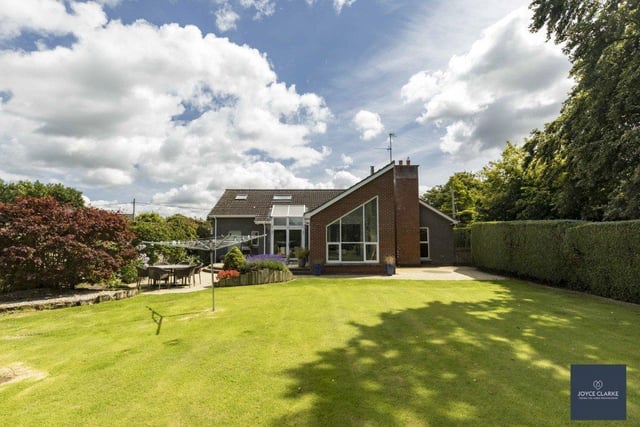This lovely property has mature private gardens.