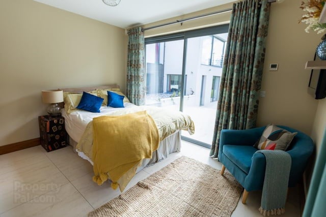 One of the double bedrooms has patio doors leading to extensive patio area.