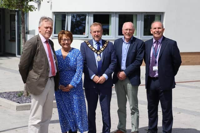 Ald Stephen Ross with Parkhall Integrated College Principal George Beattie (right) and past principals Tom Skelton, Mavis Knox and Roy Dickson.