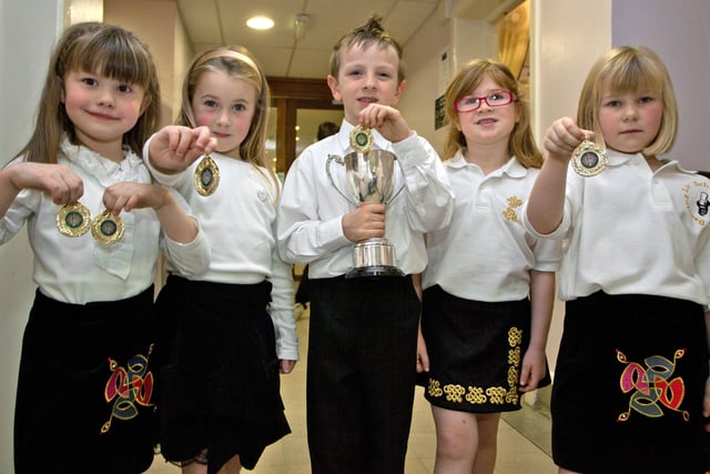 The beginners show off their cups and medals at Lir School of Irish Dancing Competiton in Ballycastle back in 2009