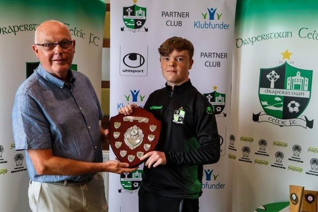 Shay Bradley received the Michael Kelly Shield for Young Clubperson of the Year from Michael Kelly.