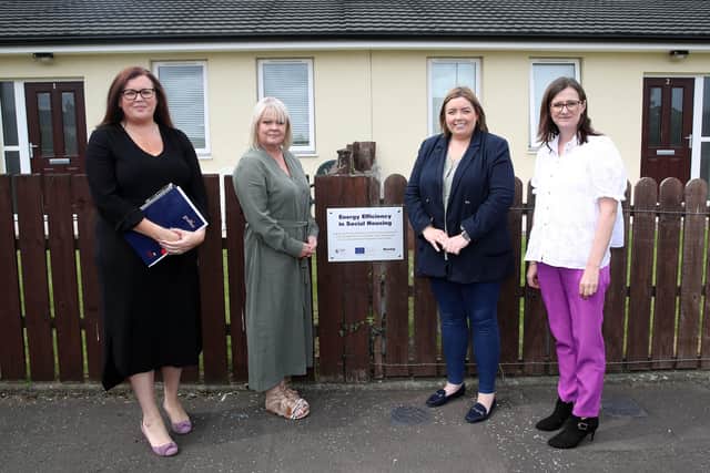 Minister Hargey with Housing Executive Assistant Director of Asset Management Leeann Vincent and Department for Economy’s Director of EU Fund Management Division Maeve Hamilton and Housing Executive Area Manager Breige Mullaghan in the Abbeyville area of Newtownabbey.