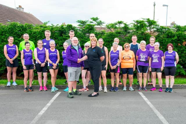 Club President Kenneth Bacon with GES Groups Lorraine Farrell