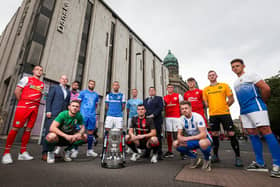 Players from the twelve premiership teams join Liam Curran, Chief Information Officer at Danske Bank and Gerard Lawlor, Chief Executive of the NI Football League
