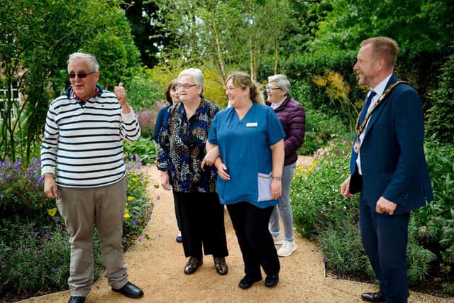The Mayor, Ald Stephen Ross, engaging with residents during the event at Antrim Castle Gardens.