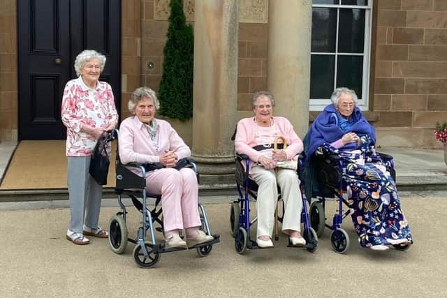 The four centenarians left to right: Etta Girvan standing; Joan Urquhart, Anne Campbell, Jeanie Moore.