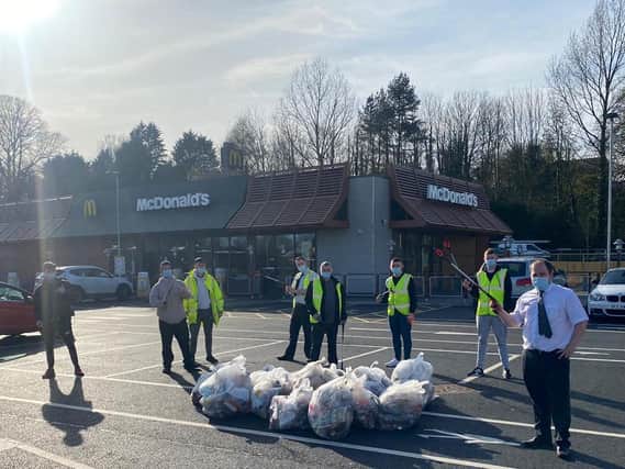 Crew members from McKinstry Road McDonald’s collect around 14 bags of litter across the restaurant’s surrounding area during a voluntary litter pick