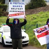 Press Eye - Belfast - Northern Ireland - 6th April 2021

Loyalists take part in a protest at the Antiville roundabout in Larne County Antrim.

Unionist communities loyal to the UK believe the Brexit sea border threatens Northern Irelandâ€TMs constitutional position within the union.

Border Control Posts (BCPs) were built at Larne harbour, and two other facilities in Northern Ireland, as a consequence of Brexit.

Photo by Kelvin Boyes / Press Eye.